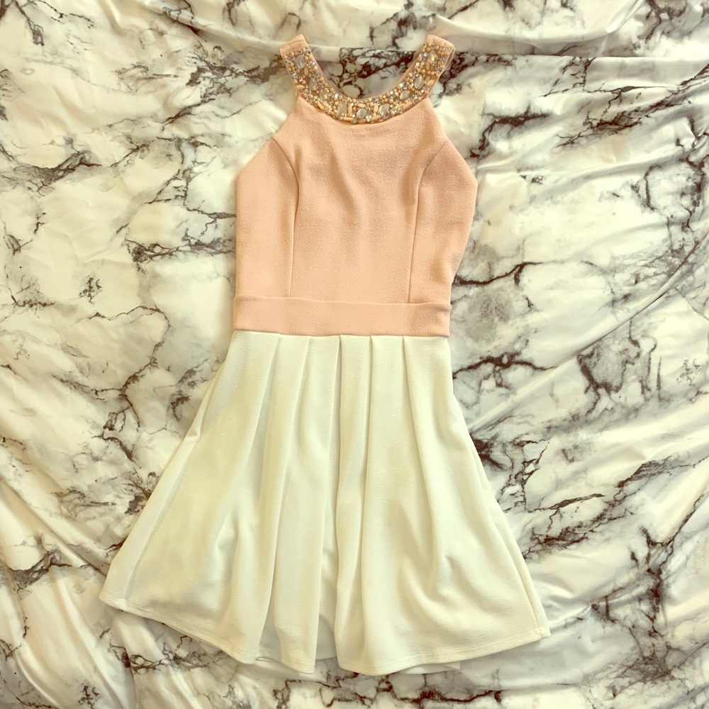 Pink/white fit and flare dress with beaded collar.